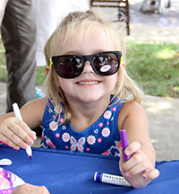 Savanna enjoys the 7th Inning Stretch Festival...