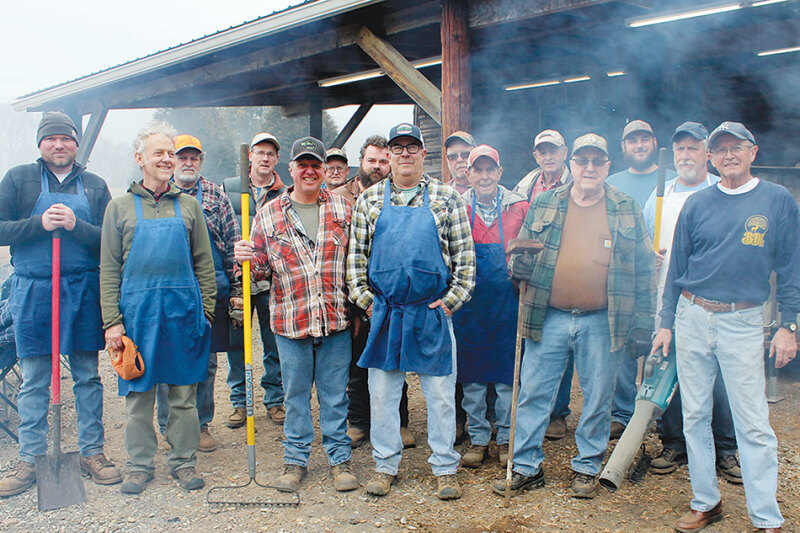  Here's Doug Fortenberry (center) and his crew of chicken cooks.