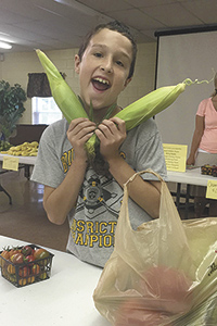 Math Academy students sharpen skills at a farmers' market