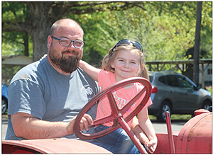 Daughter and Dad at Antique Tractory Show