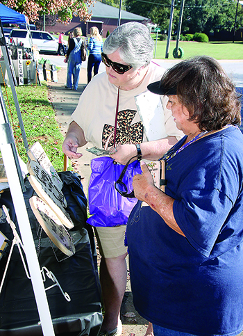 Pam Champion and Lora Ledbetter are pictured shopping at the Lattimore Fall Craft Fair on Oct. 24th Jeff Melton photo.