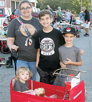 Cortney, Braiden, Jeffery and Nadalyne Goodwin were enjoying family time while looking for deals at the Mooresboro Townwide Yard Sale.