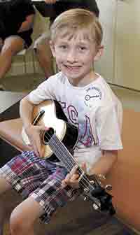 Young musicians pick and grin at Earl Scruggs Center