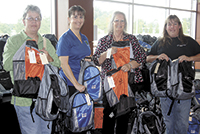 Communities In Schools “Backpack Program” Receives A Helping Hand From Local Companies