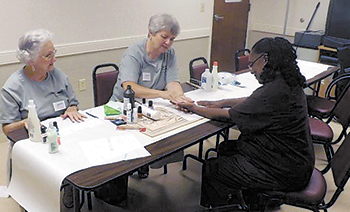 MISSION WORKERS PROVIDE MANICURES...