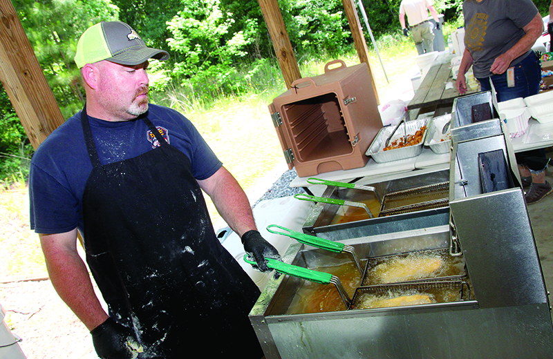 Nathan Phillips was frying fish and chicken for National Trails Day Picnic Fundraiser at the Broad River Greenway.