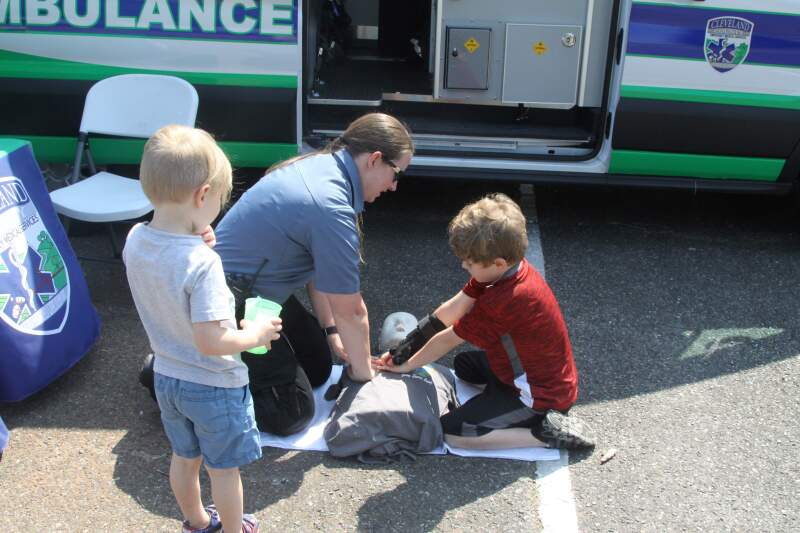 Lincoln and Aiden Early are shown how to do CPR