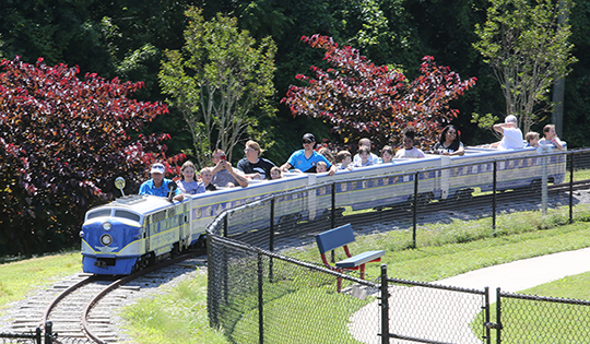 Visitors to The Shelby City Park enjoy riding the Rotary Special Train during the Sweet Safe Summer Celebration