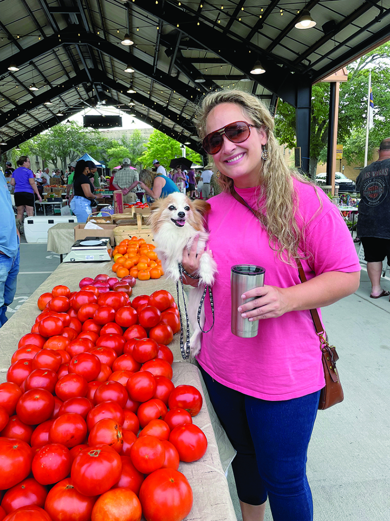 Gabrielle Tubbs with her dog Betty at the Foothills Farmers Market on Saturday July 30th. 