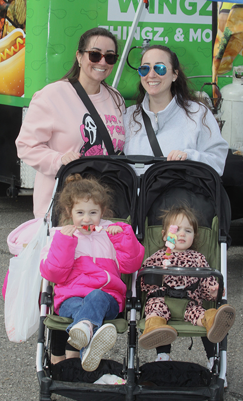 Christa Ellis and Briana Allen were strolling Rae and Brooke Allen while enjoying the festivites during Foodees and Culture Festival at the Cleveland 