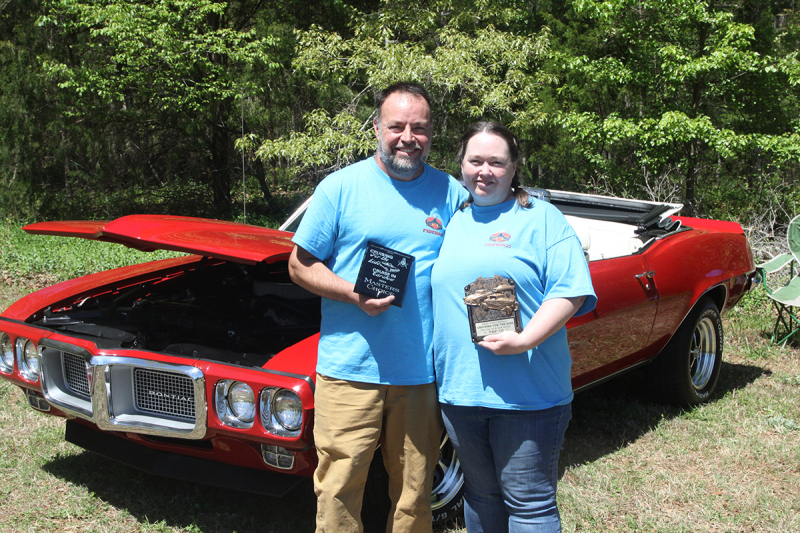 Jeff and Janet Seay is pictured with their 1969 Pontiac Firebird. The car won the Master's Award at the  Cruising for the Kids Cruise-In and Car Show 