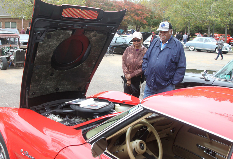 Patsy and Raphael Howell checkout this 1975 Corvette Stingray at the October Fest Vendor and Car Show at the Neal Center in Shelby.